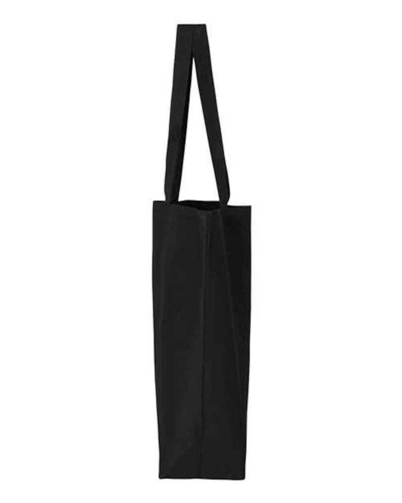 May include: A solid black tote bag with two long handles. The bag is rectangular with a simple, minimalist design. The handles are attached at the top and are the same black color as the bag. The bag is made of a sturdy material.