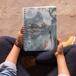 Companions at the Misty Lake: Zen-inspired spiral notebook with picturesque landscape and loyal cat - lined pages