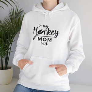 Express Your Hockey Mom Pride with Our &#39;In My Hockey Mom Era&#39; Hoodie Sweatshirt. Hockey sweatshirt. Hockey mom. Hockey era hoodie