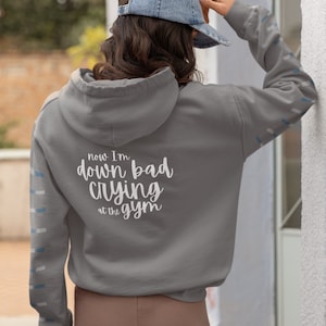 Now I&#39;m down bad crying at the gym - hoodie with Taylor lyric on back. Swiftie merch. TTPD. Taylor hoodie Down bad crying