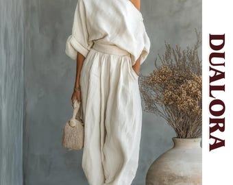 Completo composto da top monospalla e pantaloni a gamba larga, stile boho estivo da resort.