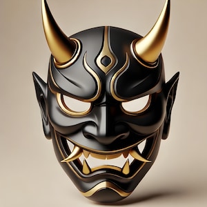 May include: A black and gold Japanese demon mask with two large gold horns. The mask has a fierce expression with sharp teeth and intricate gold detailing around the eyes, mouth, and forehead. The mask is set against a neutral background.