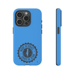 May include: A light blue phone case with a black rubber bumper. The case has a black and white distressed stamp that says "Made in Israel" with an outline of the country of Israel inside the stamp.
