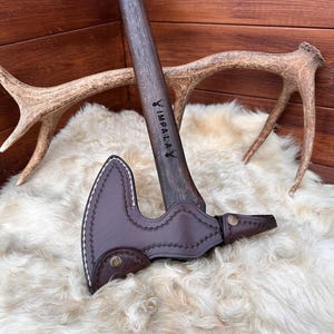 Forged Native American battle axe with custom leather sheath