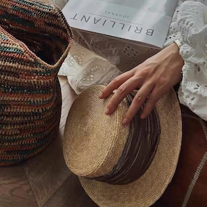 Vintage stråhatt: Elegant sommarsolhatt med brunt band