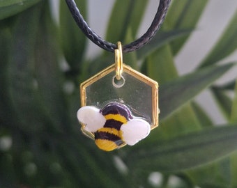 Bee necklace in honeycomb in resin