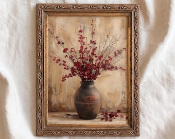 May include: A framed wall art print featuring a dark brown ceramic vase filled with vibrant red flowering branches. The vase sits on a surface against a neutral, textured background. The frame is ornate, metallic gold with a wavy, carved pattern.
