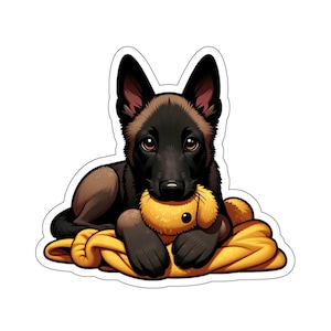 May include: A black and brown Belgian Malinois puppy is lying on a yellow blanket with a yellow stuffed animal. The puppy is looking at the camera with its mouth slightly open.