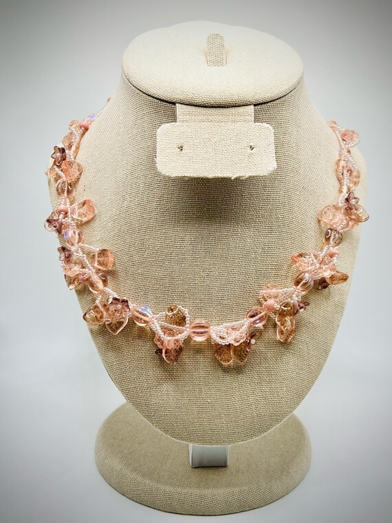 Whimsical Necklace with Floral Motif in Pink Tones - image 1