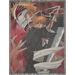 May include: A woven throw blanket featuring a dynamic anime illustration. The design showcases a character with orange hair and a black outfit, set against a red backdrop. The artwork includes a detailed mask and flowing white fabric.