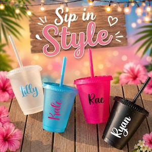 May include: Four glittery plastic tumblers with lids and straws, each personalized with a name in script font. The cups are white with blue text, blue with pink text, pink with black text, and black with white text. The text Sip in Style is visible.