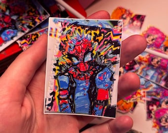 May include: A colorful sticker featuring a cartoon-style illustration of Spider-Man with a red and blue suit, surrounded by yellow and blue lightning bolts. The sticker has a white background and a jagged edge.