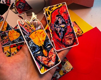 大きなスケッチブックの愛憎入りステッカーパックからのデッドプールとウルヴァリンのステッカー