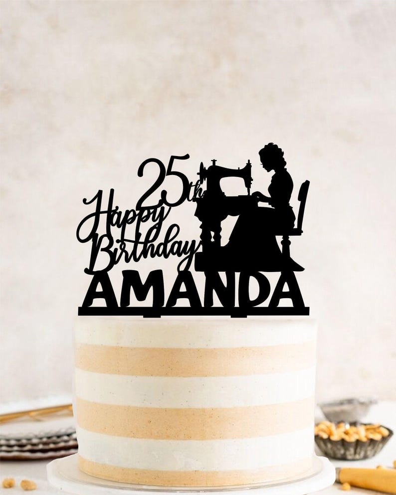 a birthday cake with a silhouette of a woman and a sewing machine