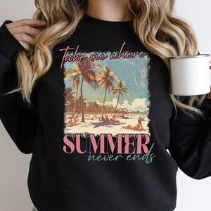 May include: Black sweatshirt with a graphic print of palm trees and the text "Take me where summer never ends".