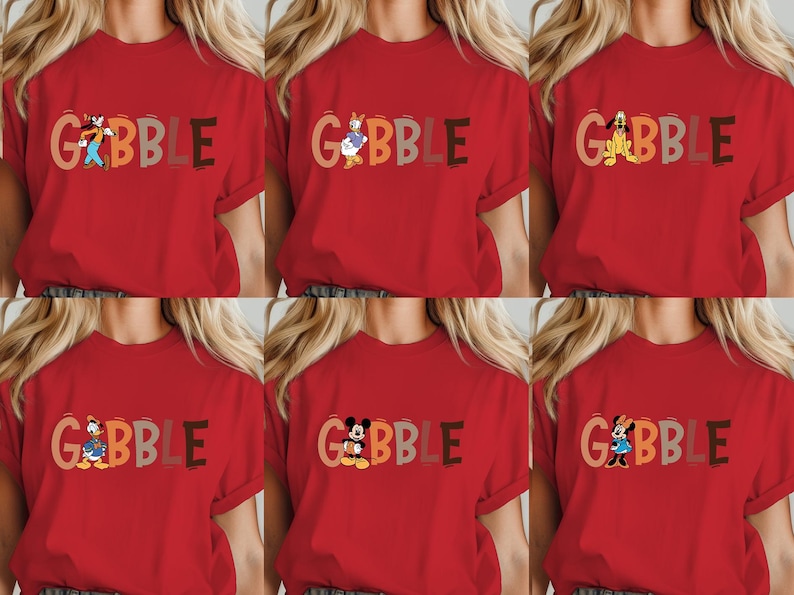 May include: Red t-shirts with the word "GOBBLE" in various colors and cartoon characters. The characters include Goofy, Donald Duck, Pluto, Daisy Duck, Mickey Mouse, and Minnie Mouse. The shirts are short-sleeved.
