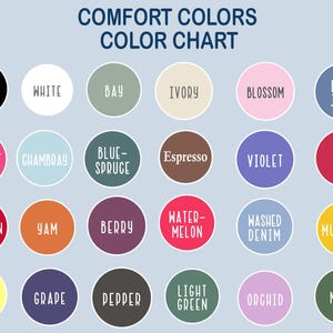 May include: A color chart titled "COMFORT COLORS" displays a variety of color swatches in circular shapes. Each swatch has a color name in white text, including Black, White, Bay, Ivory, Blossom, and Blue Jean. The chart is on a light blue background.