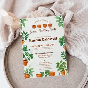 May include: A light-colored invitation for a ceramic painting party. The invitation features green plant illustrations and text that reads "You're invited to a Ceramic Painting Party" and details for Emma Caldwell's party, including the date, time, and location.