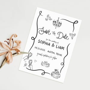 May include: A white Save the Date card with black handwritten text and illustrations. The card announces the wedding of Sophia & Liam on 09.21.2025 in Austin, Texas. Decorative elements include a dove, chandelier, angel, and swans.