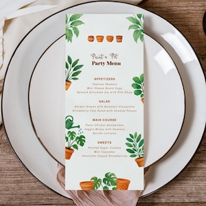 May include: A white menu card with the text "Paint a Pot Party Menu" and a list of appetizers, salads, main courses, and sweets. The menu is decorated with watercolor illustrations of potted plants and terracotta pots.