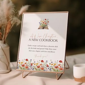 Een nieuw hoofdstuk begint Afdrukbaar receptbord | Thema boekenstapel | Verhalenboek lente wilde bloemen Open aquarel | Instructies voor keukenvoedsel canvas