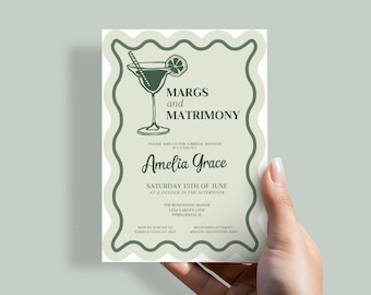 May include: A green and white bridal shower invitation with a drawing of a margarita glass. The text reads "Margs and Matrimony" honoring "Amelia Grace". The invitation includes the date, time, and location of the event.