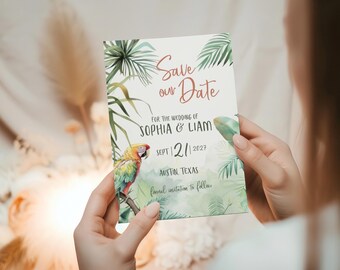 May include: Save the date card with tropical leaves and a parrot. The card says "Save our Date" for the wedding of Sophia & Liam on September 21, 2027 in Austin, Texas.