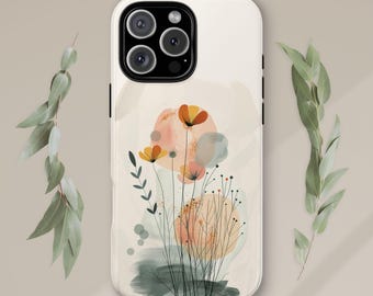 Könnte beinhalten: Eine weiße iPhone-Hülle mit einem Aquarell-Design aus orangefarbenen und gelben Blumen mit grünen Stielen und Blättern. Der Hintergrund ist ein sanftes Beige mit abstrakten Aquarellformen in Grautönen, Pfirsich und Hellblau. Die Hülle hat einen klaren Kameraobjektiv-Ausschnitt und der Text "bloom & bones" ist unten aufgedruckt.