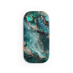 May include: A teal and gold marble design phone case with a rounded shape.