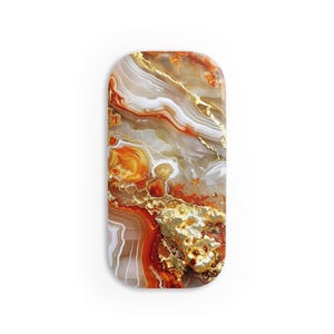 May include: A rectangular decorative object with rounded corners, featuring a swirling pattern of orange, white, and gold. The design resembles agate stone, with veins and textures. The object has a glossy finish.