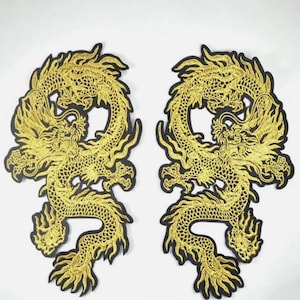 May include: Two gold embroidered iron-on patches of Chinese dragons on a black background.