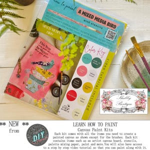 May include: A mixed media bird canvas paint kit with stencils. The kit includes a canvas, custom stencil, palette mixing paper, and a video tutorial. The kit also includes a color key with paint colors. The kit is packaged in a clear plastic bag.