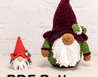 May include: A crochet pattern for making two gnomes. The larger gnome is green and red with a white beard. The smaller gnome is red and white. The pattern is called "PDF Pattern".
