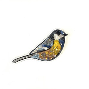 a picture of a bird made out of mosaic tiles