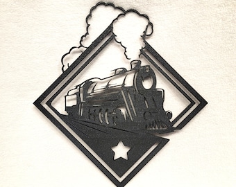 May include: Black metal wall art featuring a detailed train design within a diamond-shaped frame. The train is depicted with smoke billowing from its smokestack, and a star is at the bottom. This decorative piece is suitable for home decor.