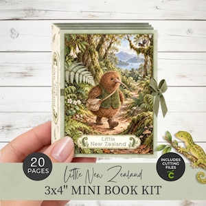 May include: A 3x4 inch mini book kit titled Little New Zealand featuring a 20-page capacity. The cover displays a brown kiwi bird wearing a green vest and carrying a satchel on a forest path, with a green ribbon tie and cutting files included.