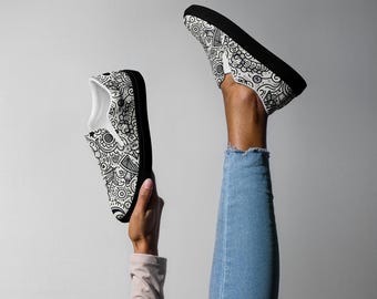 Zapatillas de lona sin cordones para mujer con estampado de garabatos en blanco y negro
