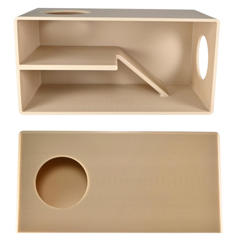 May include: Beige wooden small pet habitat with a shelf, ramp, and circular and oval openings. The habitat is rectangular with a removable top. The design includes a small shelf and a ramp for easy access.