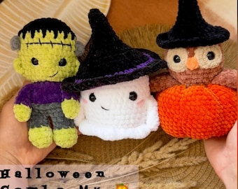 May include: A trio of handmade Halloween-themed crochet figures: Frankenstein's monster, a ghost, and an owl in a pumpkin. The Frankenstein figure is green, purple, and gray. The ghost is white with a black witch hat. The owl is brown and orange.