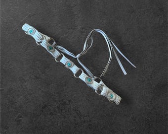 Fashionable leather hat band with silver and turquoise ornaments. Adjustable size