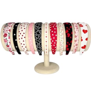 Valentine’s print headbands women or girls with red, pink, and black hearts.