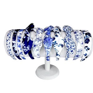 Blue headbands women or girls covered in blue floral prints.