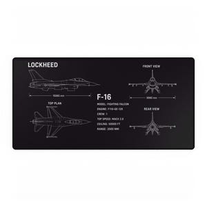 May include: A black rectangular desk mat featuring white technical line drawings of the Lockheed F-16 Fighting Falcon. The print includes side, top, front, and rear views with dimensions of 15060 mm and 9960 mm, plus technical specifications.