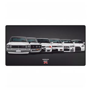 May include: A black and white illustration of a lineup of seven white Nissan Skyline GT-R cars, with the text "NISSAN GT-R" below the cars.