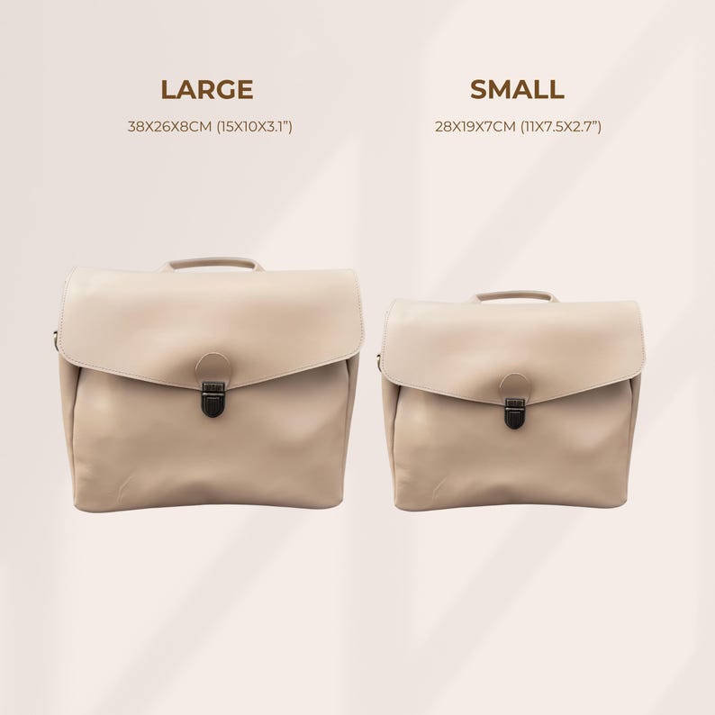 May include: Two beige leather briefcases are shown, one large and one small. The large briefcase measures 38x26x8cm, and the small one is 28x19x7cm. Each has a flap closure and a top handle. The words "LARGE" and "SMALL" are above each briefcase.