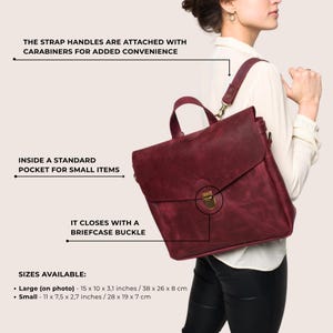 May include: A burgundy leather satchel with a briefcase buckle. The strap handles are attached with carabiners. Inside, there is a standard pocket for small items. The large size is 38 x 26 x 8 cm. The small size is 28 x 19 x 7 cm.