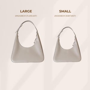 May include: Two light gray shoulder bags, one large and one small, are displayed. The large bag measures 11.4 x 9.4 x 3 inches, while the small bag is 9.8 x 7.8 x 3 inches. Both bags have a curved design and a single shoulder strap.