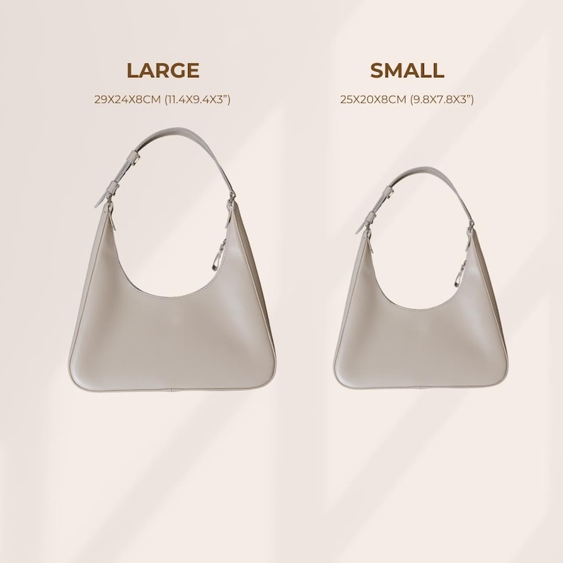 May include: Two light gray shoulder bags, one large and one small, are displayed. The large bag measures 11.4 x 9.4 x 3 inches, while the small bag is 9.8 x 7.8 x 3 inches. Both bags have a curved design and a single shoulder strap.