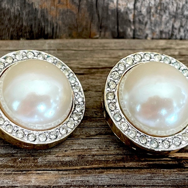 Vintage Faux Pearl and rhinestone domed button clip ons. Signed “Carolee” Vintage 1960’s Jackie O. elegant style.