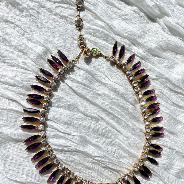 1950’s Hollycraft Purple navette and rhinestone necklace in gold tone. Vintage Hollycraft adjustable collar necklace in purple.